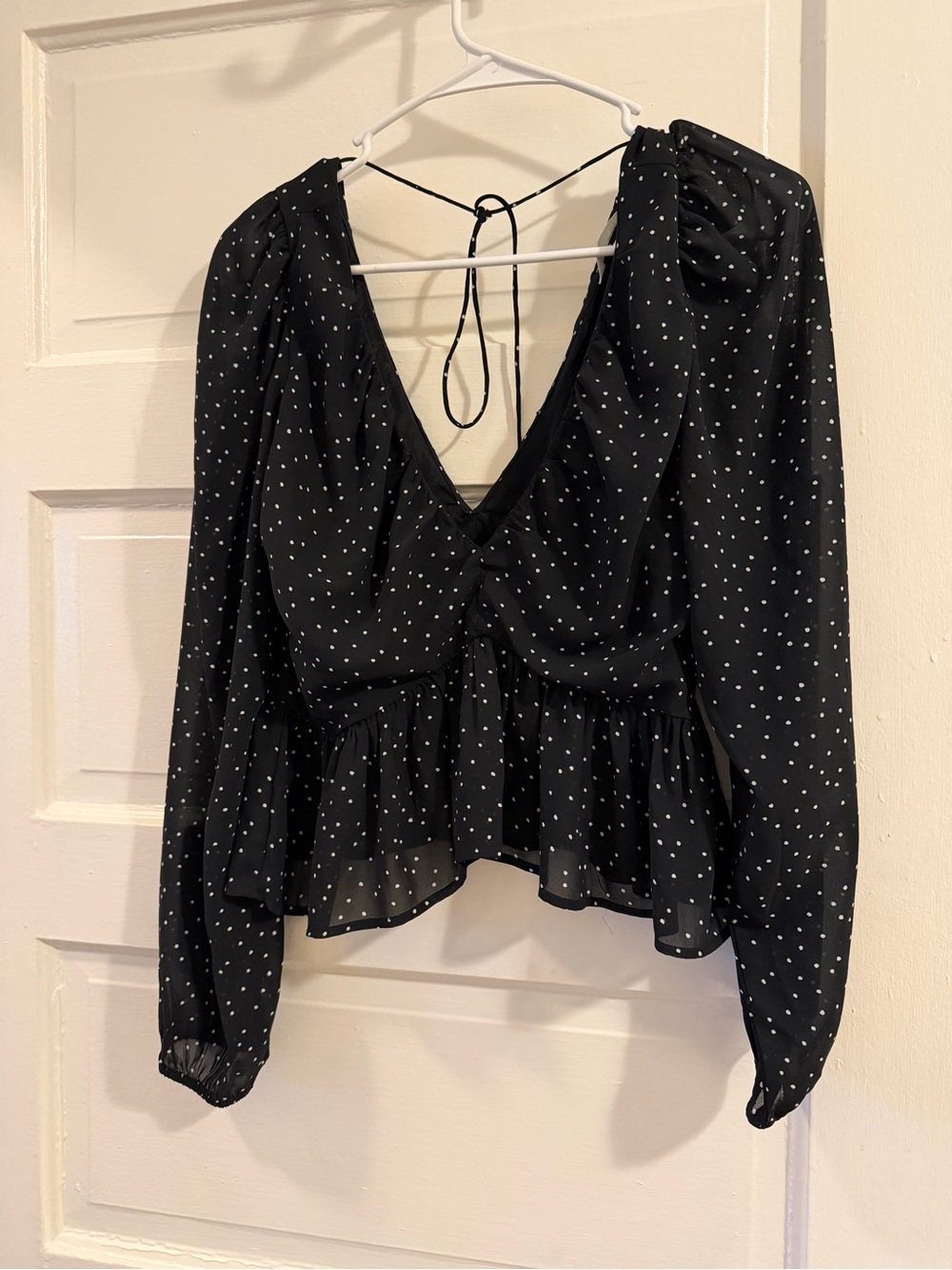 H&M Black Blouse with White Polka Dots and Peplum Hem